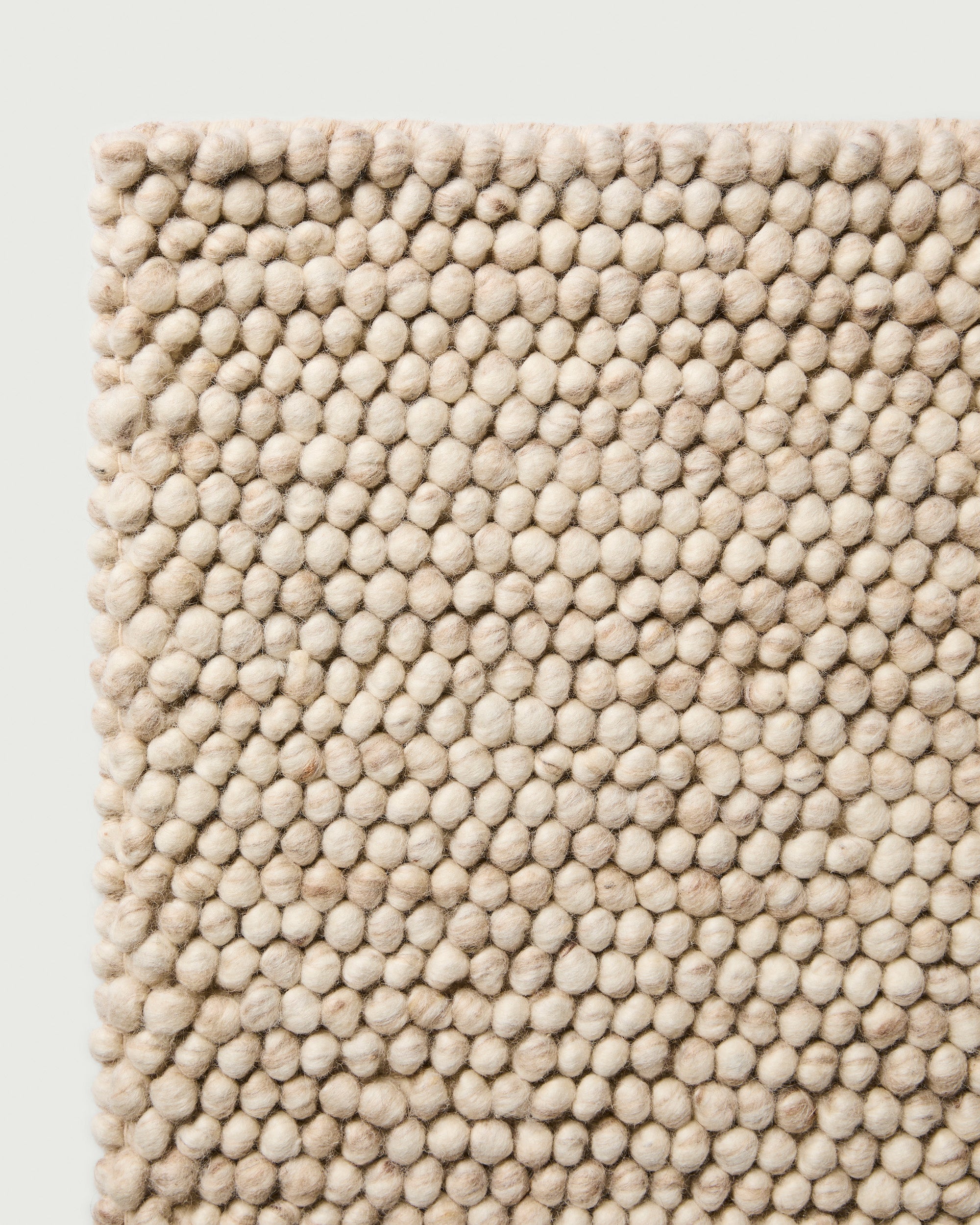Sample of Pebble Rug Stone