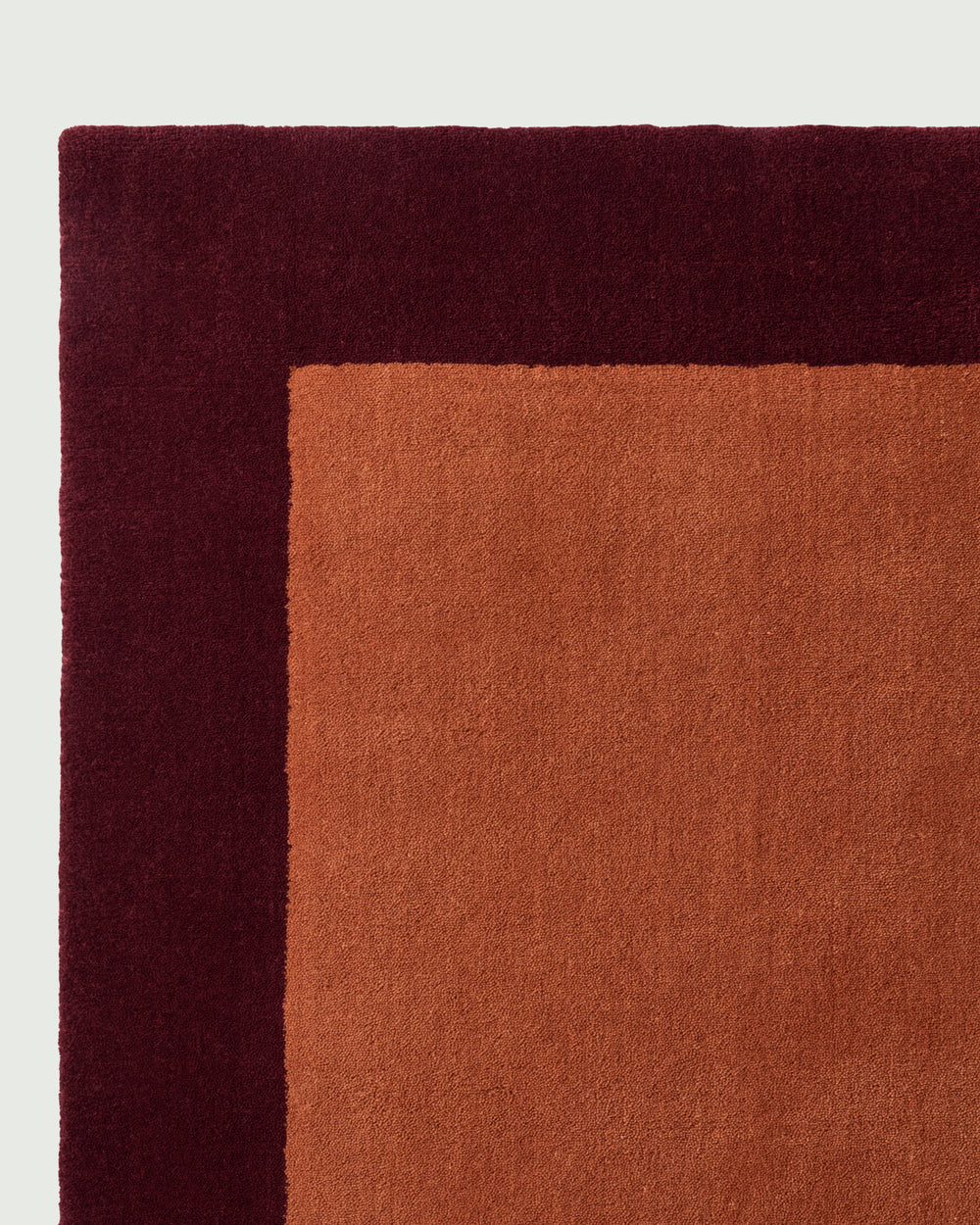 Frame Rug Merlot & Copper – Modern Wool Rug | Milk & Sugar